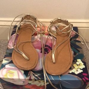 Gold gladiator sandals